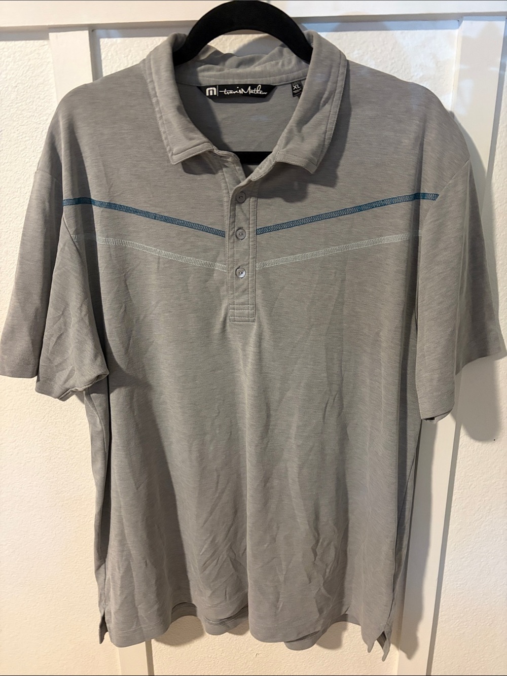 Travis Mathew Men’s Light Gray Polo with Teal & Gray Chevron Accents